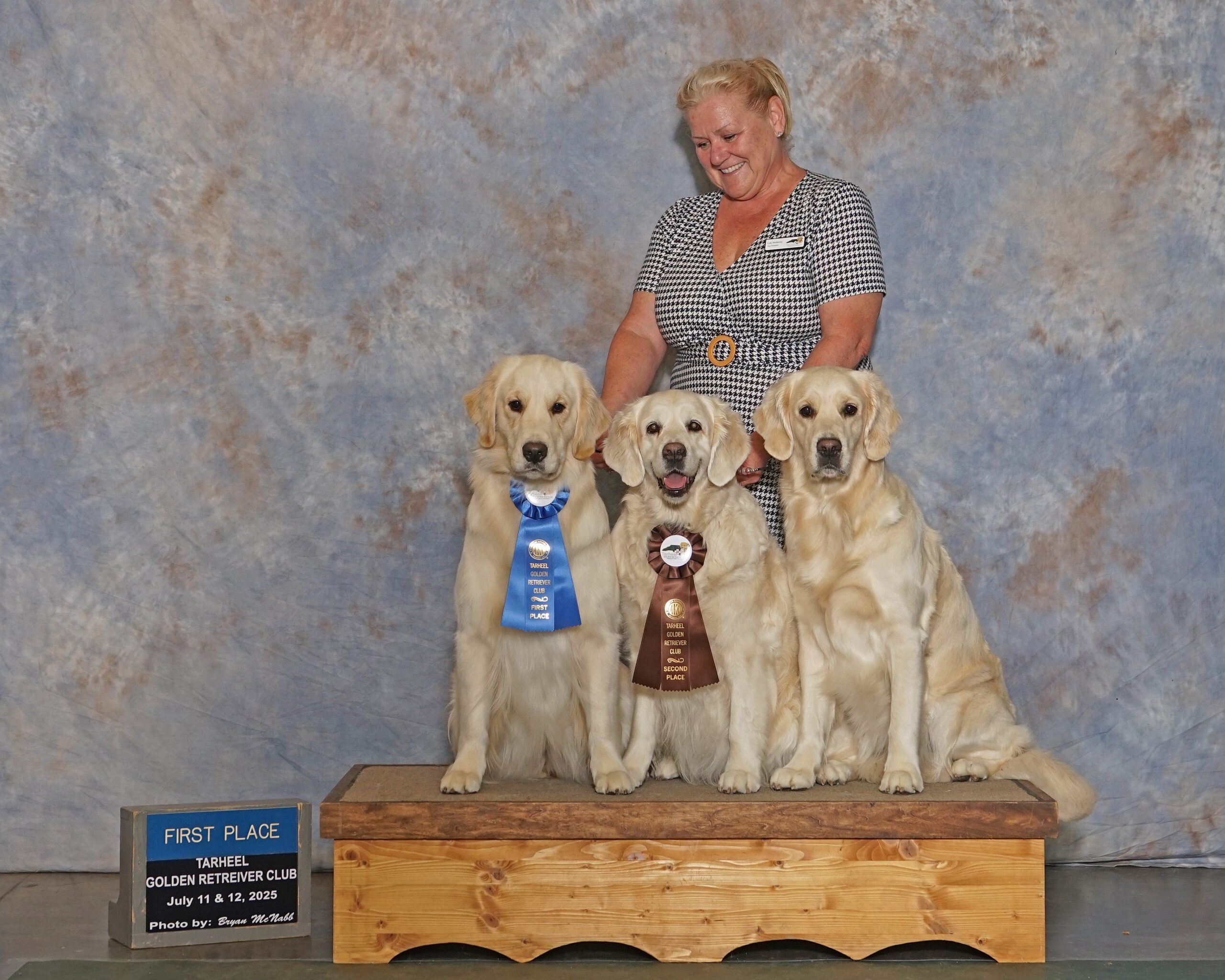 Three generations: Jaya (center), daughter Janessa (right) and granddaughter Jyoti (left) at the Tarheel Golden Retriever Specialty, Concord NC, July 2025